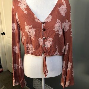 Orangey-red floral crop top